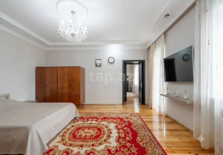9 otaqlı mənzil , Oğuz