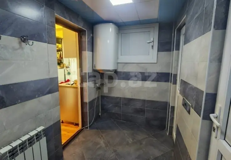 9 otaqlı mənzil , Oğuz