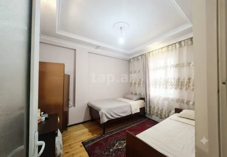 9 otaqlı mənzil , Oğuz