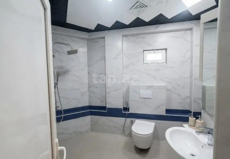 9 otaqlı mənzil , Oğuz